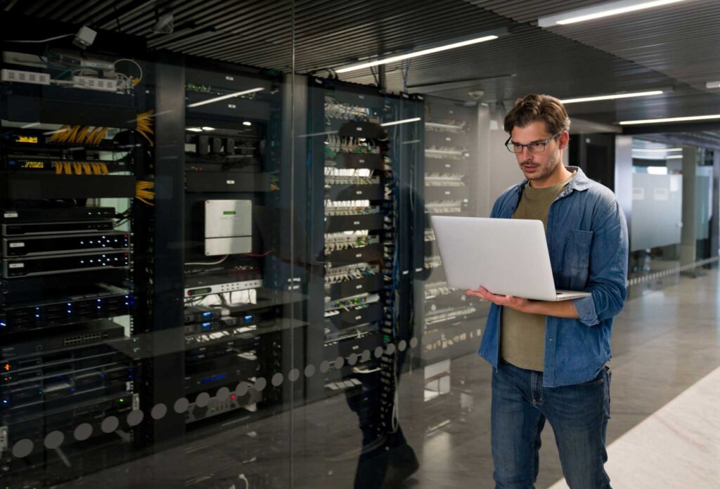 Engineer checking equipment in a data centre